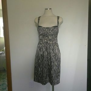 Bebe silk lace pattern peekaboo strappy dress